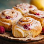 Heavenly Delight: Raspberry Cinnamon Rolls with Lemon Cream Cheese Frosting