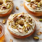Pistachio-Honey Schmear Bagel Melts with Toasted Almonds